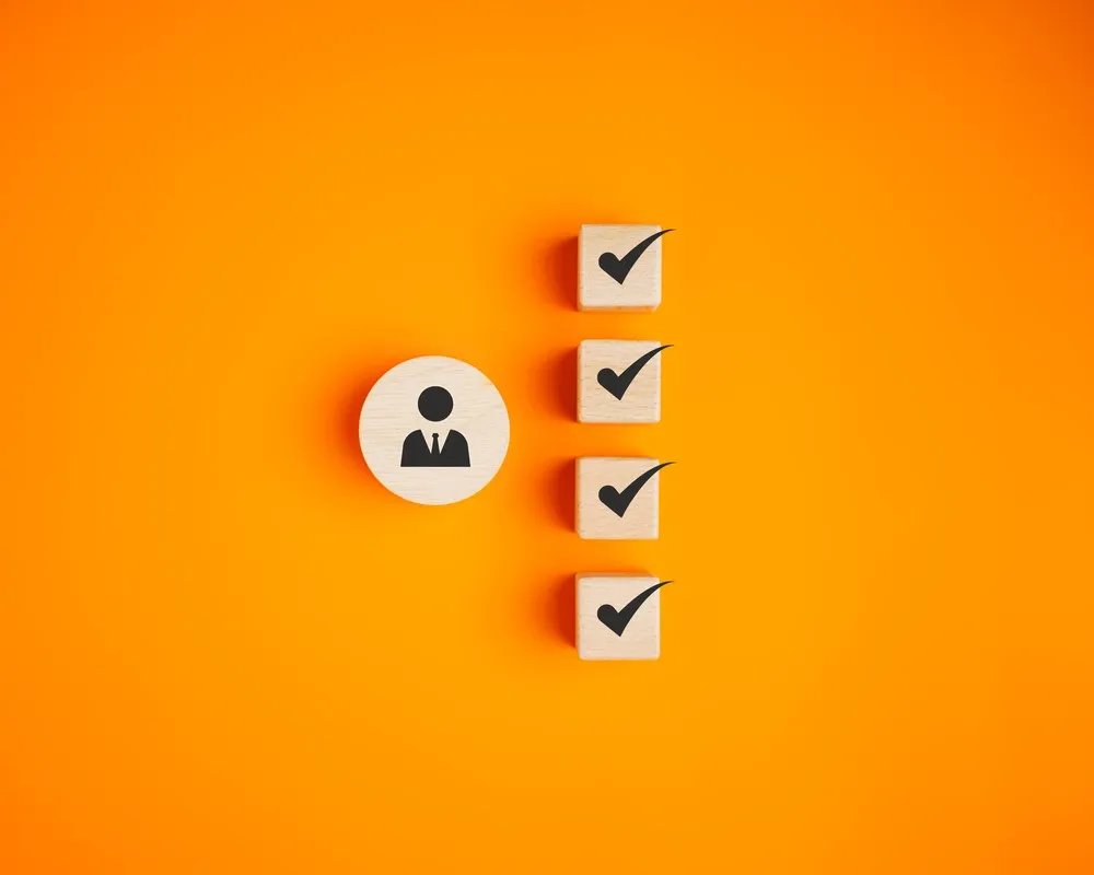 Person with ticks - representing Competency