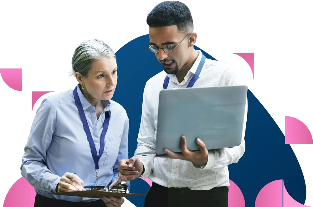 Business colleagues in professional attire reviewing documents together against abstract pink and blue background