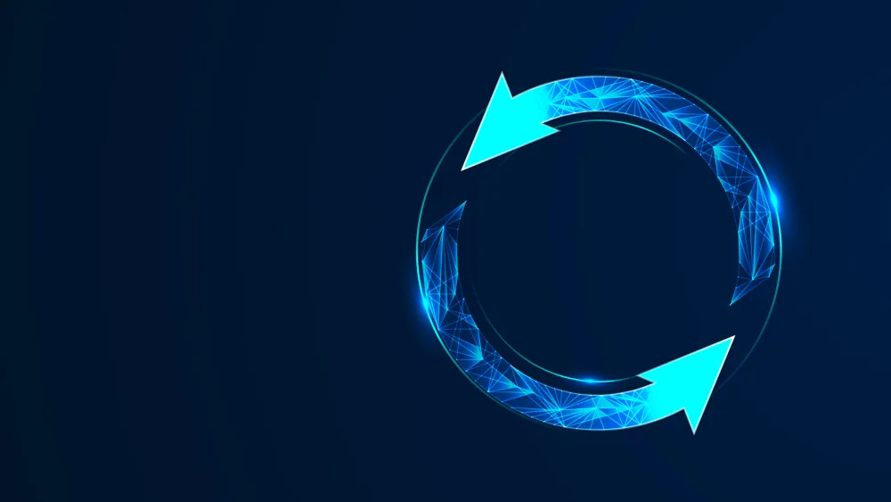 Glowing blue circular arrow forming a ring against dark background