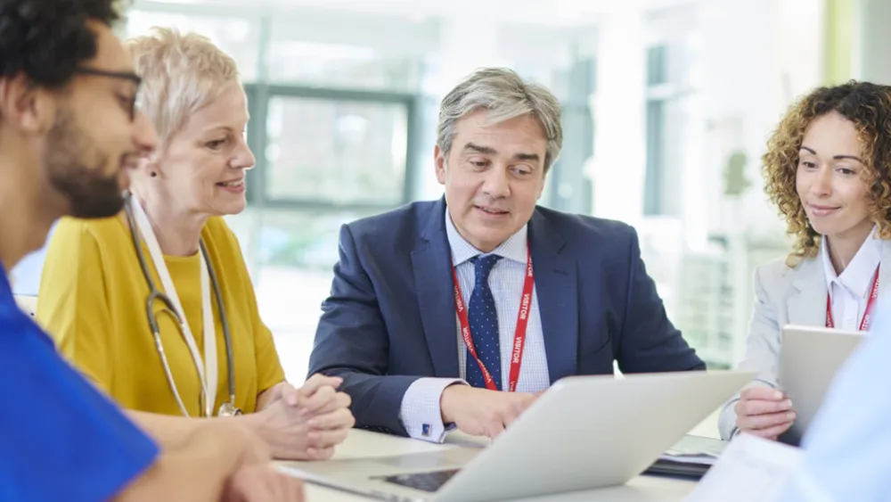 NHS staff at table